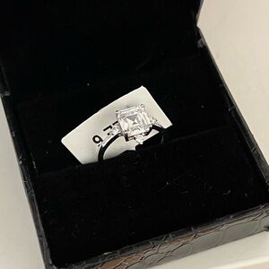 Charmed Aroma Elegant Silver Ring with Clear Gemstone